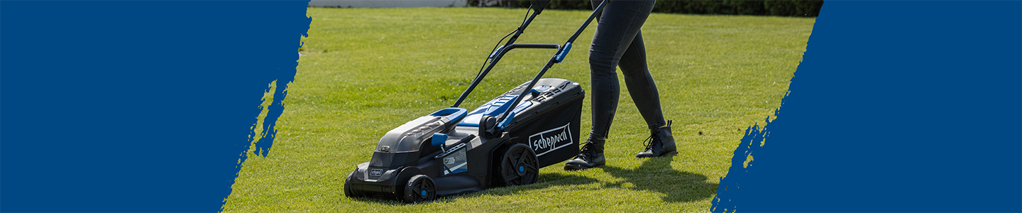 Scheppach-Gartenmaschine mit Lenkgriff, bereit für den Einsatz auf dem Rasen