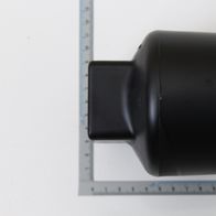 Absaugstutzen, Ansicht von oben, mit Messskala im Hintergrund.