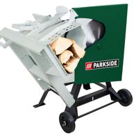 Wippkreissäge PWKS 700 A1 Parkside LB8 von vorne mit Holzstamm im Schnittbereich.