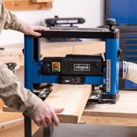 Scheppach thickness planer with control handle, safety guard, and digital display for settings and blade positions