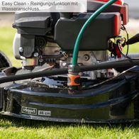 Der Benzin-Rasenmäher MP150-46 von Scheppach hat eine Easy Clean-Reinigungsfunktion mit Wasseranschluss. Die Schnittbreite beträgt 46 cm.
