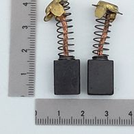 Kohlebürsten (1 Satz = 2 Stück) 14,2x10,8x6,9. Zwei Bürsten mit goldenen Kontakten und schwarzen Basen, daneben ein Lineal zur Größenveranschaulichung.