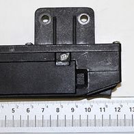 Scheppach Laser kpl. mit Messskala im Hintergrund. Die Ansicht zeigt die Vorderseite des Lasers.