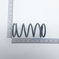 Druckfeder (Scheppach) mit spiralförmiger Form, Messlatte für Größenvergleich