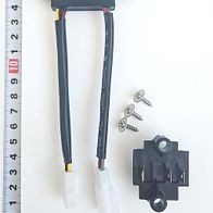 Startmodul kpl. IXES 20V Serie. Messskala im Hintergrund. Werkzeug mit zwei Kabeln und Schrauben. Werkzeug mit zwei Kabeln und Schrauben. Werkzeug mit zwei Kabeln und Schrauben.