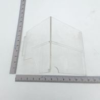 Staubabdeckung von Scheppach, gezeigt von der Seite mit einem Lineal zur Größenveranschaulichung.