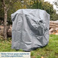 Graue Abdeckhaube mit Schutz gegen Wettereinflüsse, ideal für den Schutz von Maschinen und Materialien.