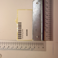 Klemmblech von Scheppach, Artikelnummer 40253006, mit Barcode und Beschriftung, von der Seite fotografiert.