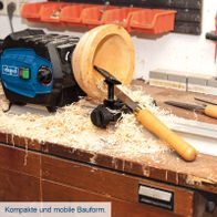 Scheppach-Drechselmaschine mit kompakter Bauweise und mobiler Anordnung, Fokus auf Werkstückbearbeitung bis 600 mm