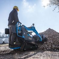 Kompaktladermaschine mit Schaufel und Erdbohrern für Materialhandhabung und Bodenbearbeitung