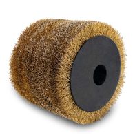 Metal wire brush with black center and gold-brown bristles, photographed from above.