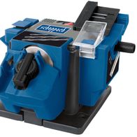 Multischleifer GS650 von Scheppach, gezeigt von der Seite. Der Schleifer hat einen blauen und schwarzen Kunststoffkörper mit einem transparenten Kunststofffenster. Der Schleifer hat einen schwarzen Griff und einen schwarzen Schalter.