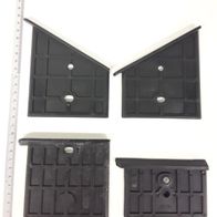 Kunststoffführungen oben 1Set = 4Stk. von Scheppach. Vier schwarze Führungen mit Löchern und Noppen. Maße: ca. 15 cm breit und 10 cm hoch.