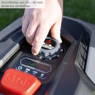 Der Mähroboter RoboCut XL600 von Scheppach hat eine stufenlos einstellbare Schnitthöhe von 20 bis 60 mm. Die Einstellung erfolgt über ein Drehregler mit Skala.