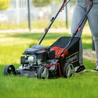 The Scheppach Self-Propelled Petrol Lawn Mower MS132-42 with 42cm cutting width and 45L bag. 131cc engine, OCV technology for efficient mowing.