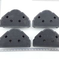 Fußkappe (4 Stück) aus Kunststoff, von oben fotografiert.