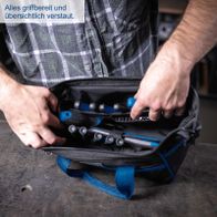 Organisierte Werkzeugtasche mit griffbaren Halterungen für schnelle Zugriffsmöglichkeiten