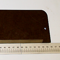 Tischeinlage 8x75x555 von Scheppach, gezeigt von der Seite mit einem Maßstab daneben.