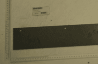 Scheppach Schablonenring, gezeigt von der Seite, mit einem Lineal zur Größenveranschaulichung.