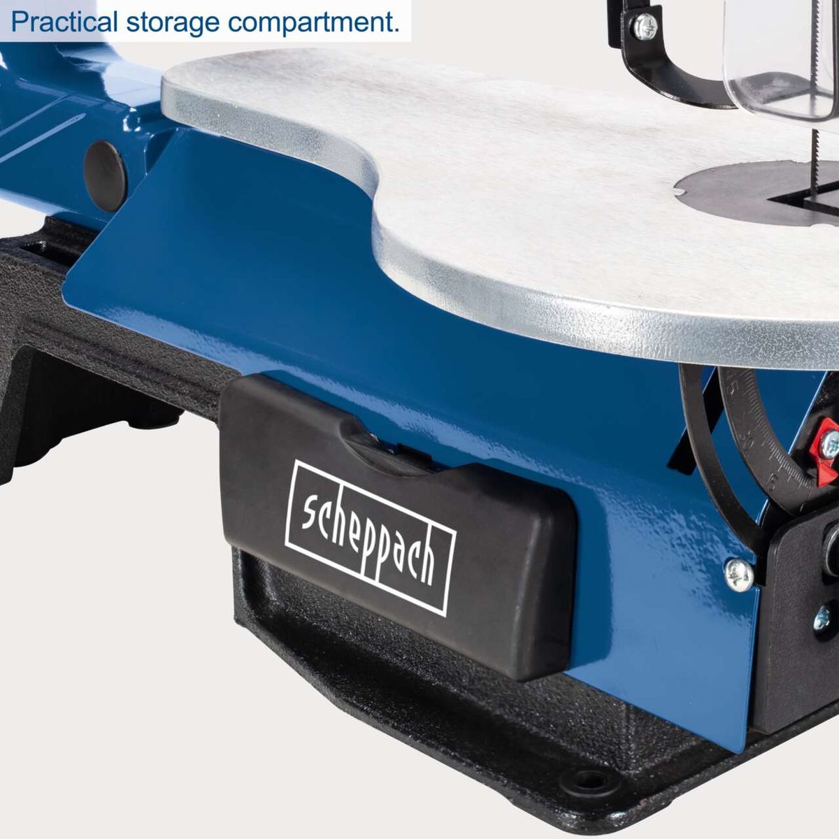 Practical storage compartment for tools or accessories on a scroll saw