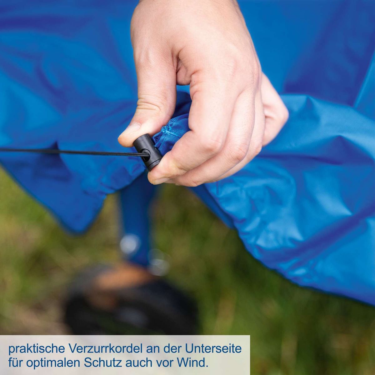 Die Abdeckhaube von Scheppach verfügt über praktische Verzurrkordeln an der Unterseite für optimalen Schutz auch vor Wind.