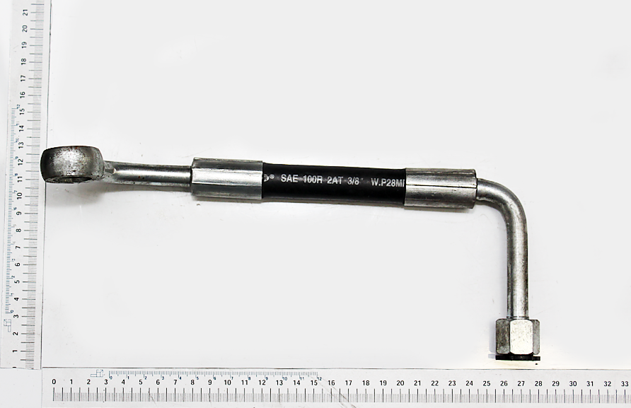 Hydraulikschlauch M18x1,5 / Auge 20 / 260, Ansicht von der Seite, mit Messskala im Hintergrund.