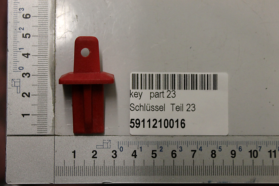 Scheppach-Schlüsselteil (Teil 23) mit Beschriftung und Barcode