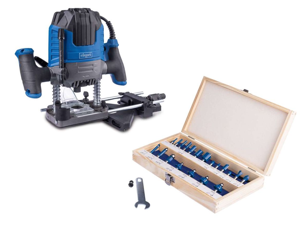 Elektro-Oberfräse WRT1200 von Scheppach mit Zubehör. Gezeigt von der Seite mit geöffnetem Zubehörkoffer.