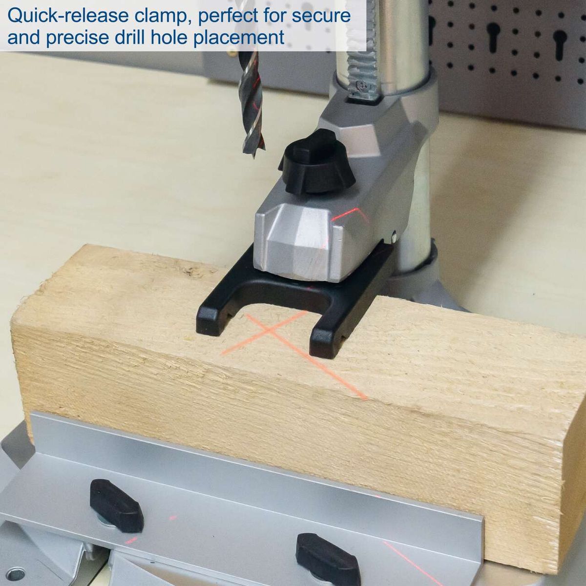 Quick-release clamp for secure and precise drill hole alignment on Scheppach DP55 bench drill