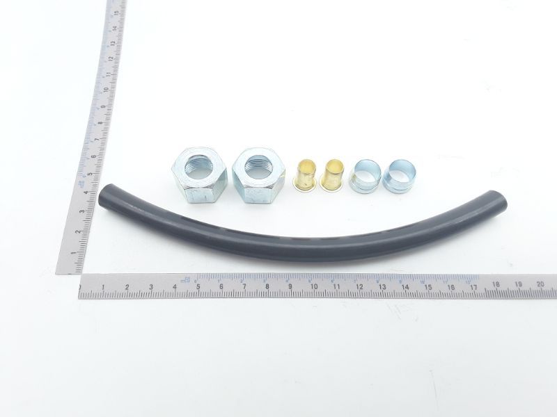 Ölleitung Mutter M18x1,5 / Ø12 von Scheppach. Gezeigt von der Seite mit einem Lineal zur Größenveranschaulichung.