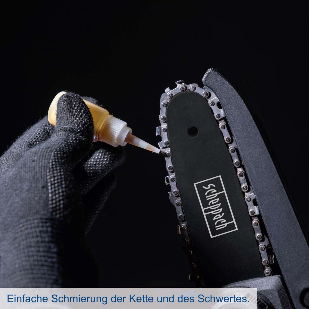 Kette und Schwert einer Scheppach-Werkzeugkette mit einfacher Schmierung dargestellt