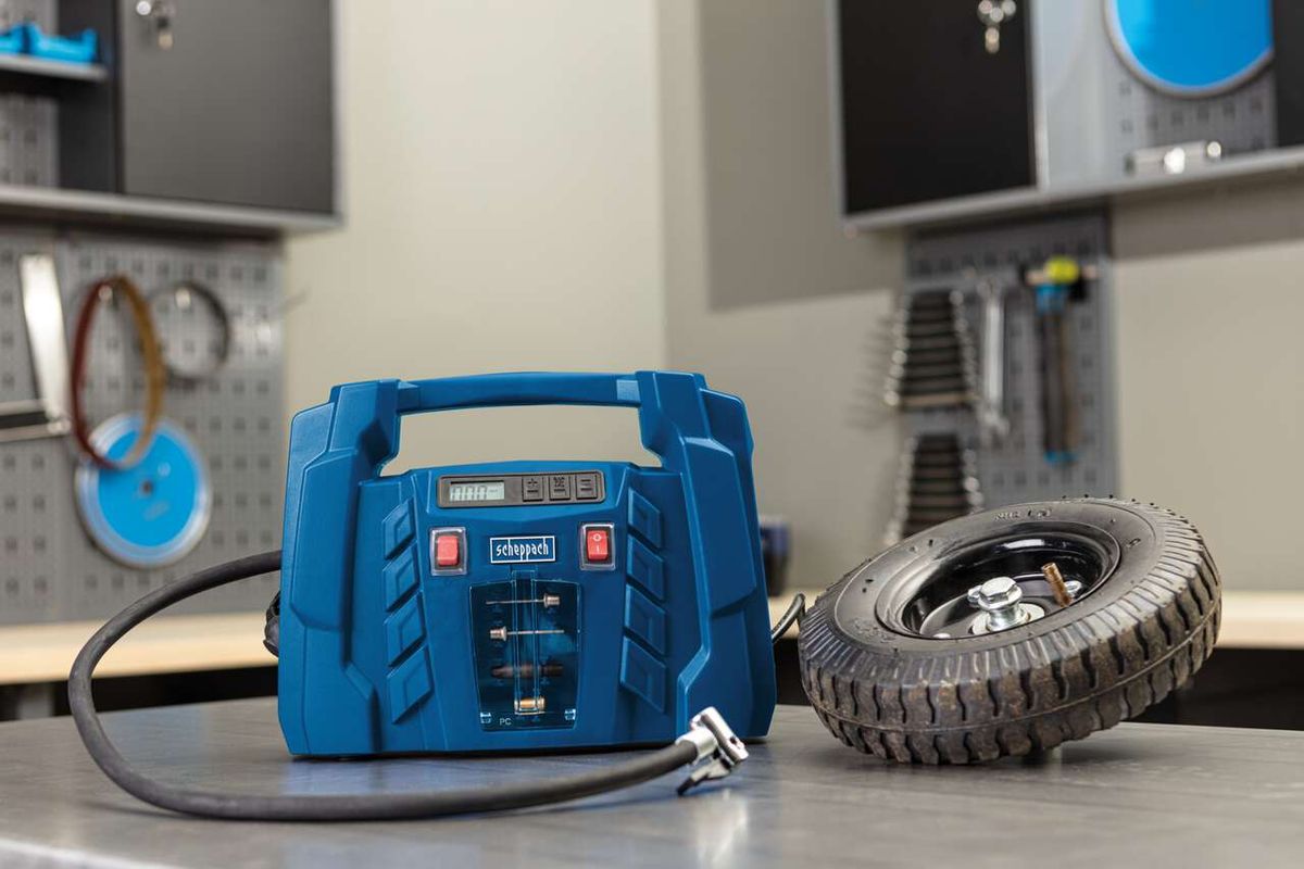 Portabler Luftkompressor mit integriertem Zubehörset für KFZ-Reparaturen, inkl. Reifenventil und Werkzeug