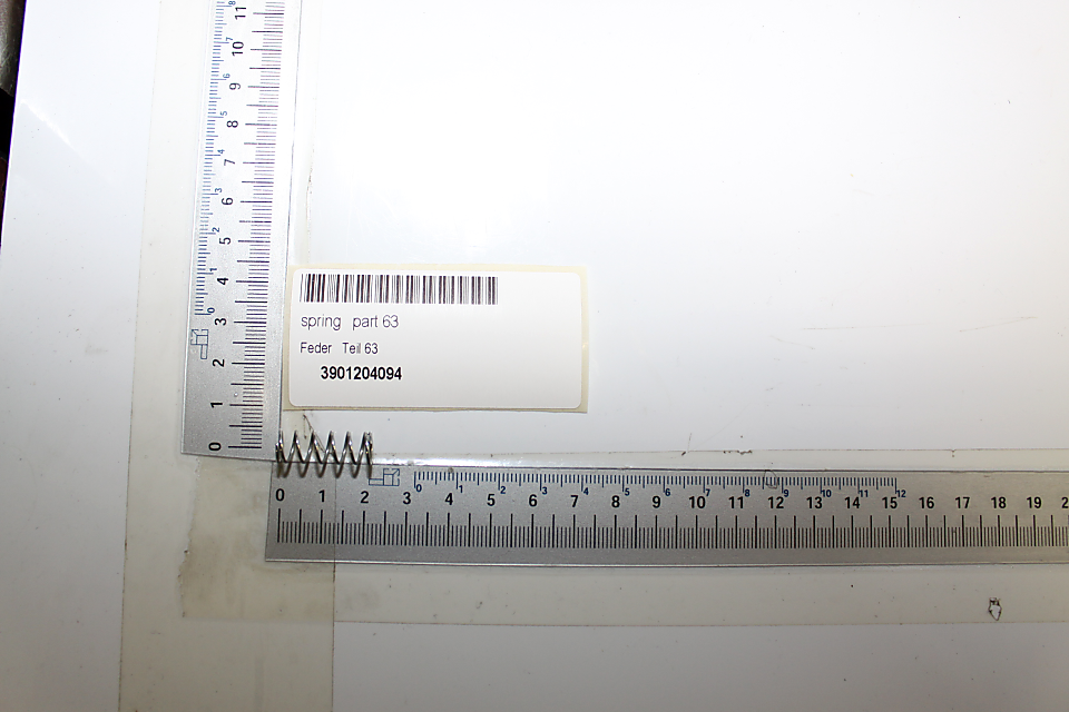 Scheppach-Druckfederteil (Teil 63) mit Beschriftung und Maßband