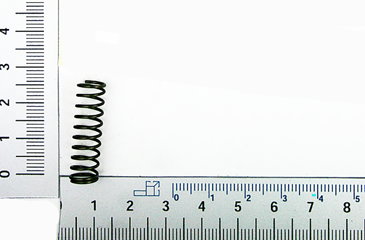 Scheppach-Feder mit spiralförmiger Windung, Messskala zur Orientierung
