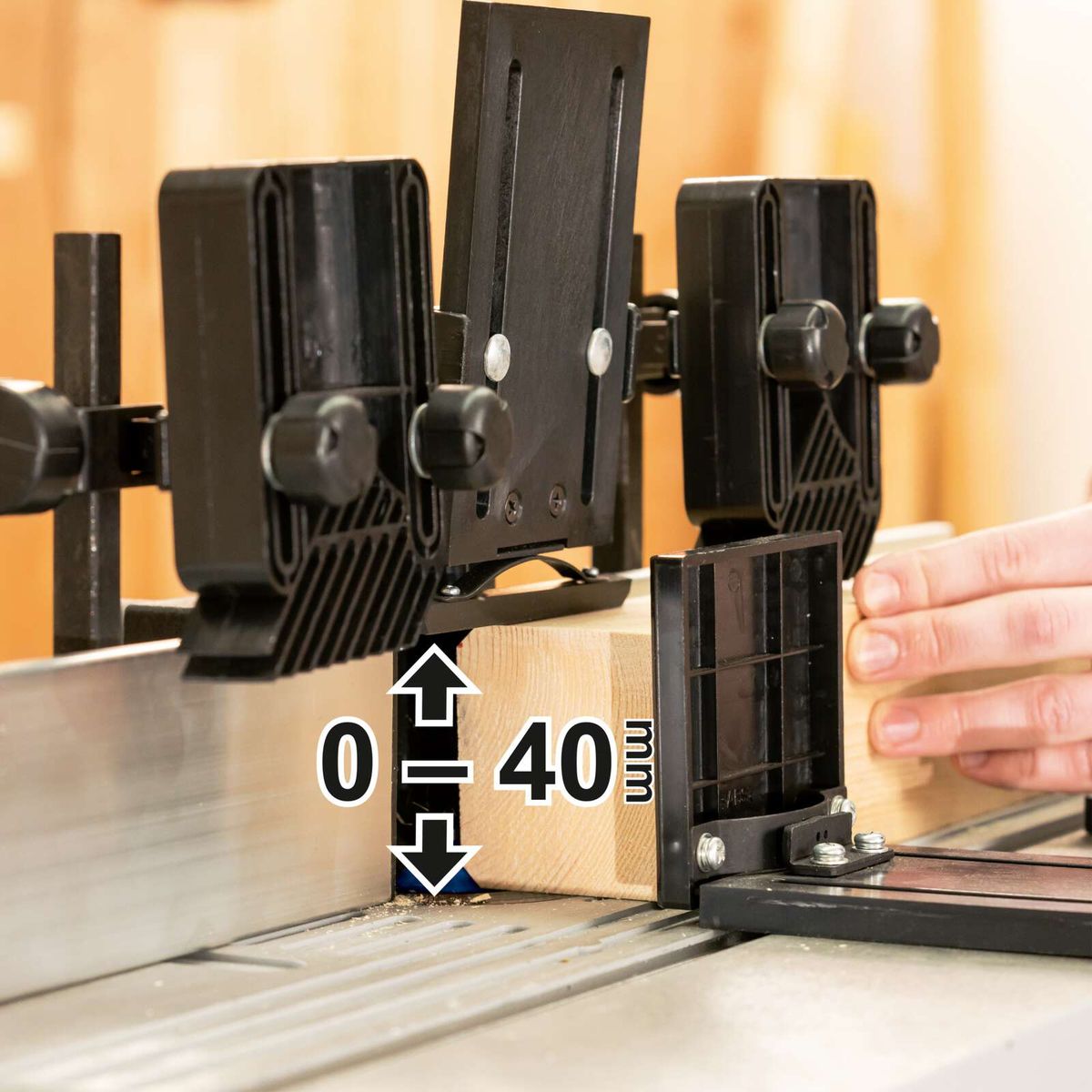The Scheppach HF50 router table features a 40 mm spindle height and is compatible with 6, 8, and 12 mm collets. It includes a table extension for increased workspace.