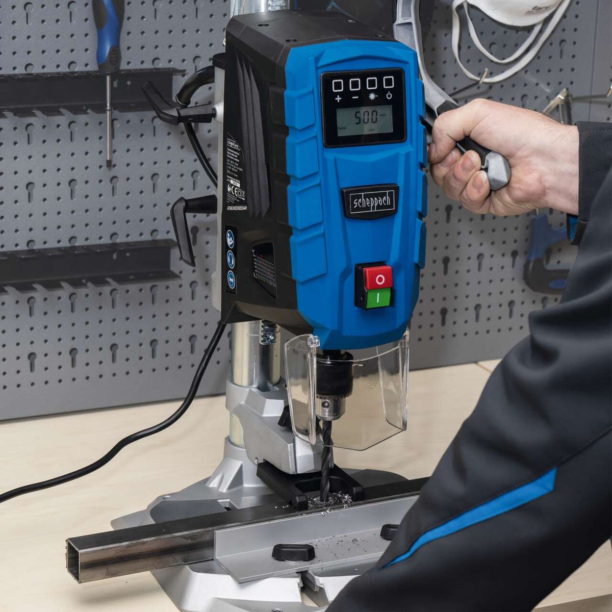 The bench drill DP55 by Scheppach features a digital display for precise settings, a red and green start button for easy operation, and a sturdy construction for reliable performance.
