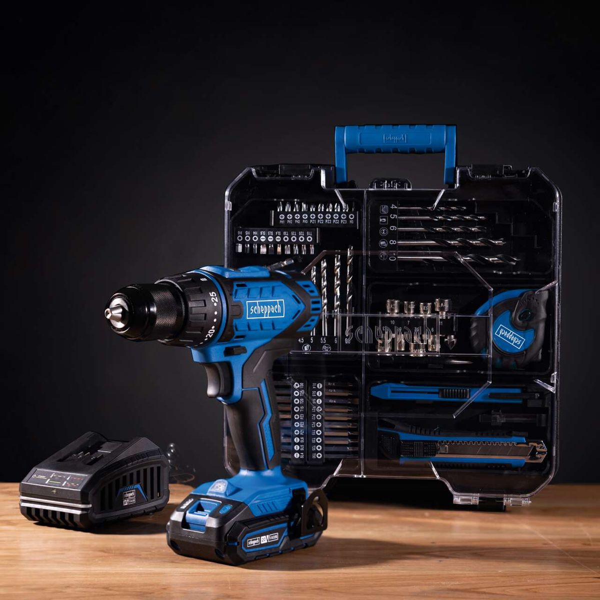 Mobile workshop C-DTB74/1-X by Scheppach with 1.5-13mm clamping range and 50Nm torque, without impact function. Includes cordless drill, charging station, and accessories such as bits and drills.