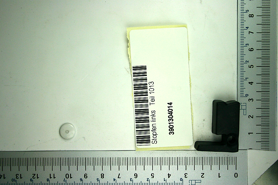 Scheppach-Setteil für Stopfen links (Teil 1013), Teilstück mit Beschriftung und Barcode