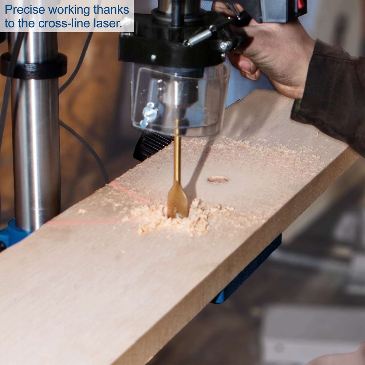 Bench drill with cross-line laser guiding during wood drilling