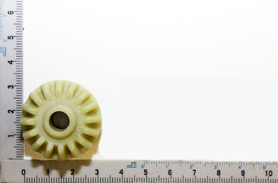 Kegelrad (Winkeleinstellung) Ø32x16 z=16, Ansicht von vorne, neben einem Lineal zur Größenveranschaulichung.