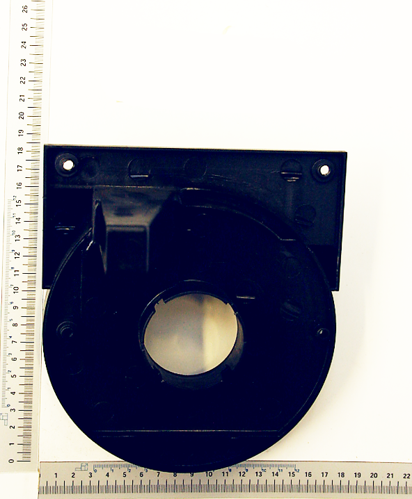 Schleiftellergehäuse, Ansicht von vorne, mit Befestigungslöchern und zentraler Öffnung.