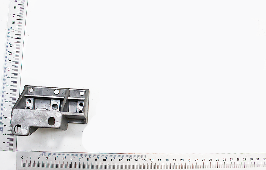 Konsole für Schwenksegment von Scheppach. Gezeigt von der Seite mit einem Lineal zur Größenveranschaulichung.